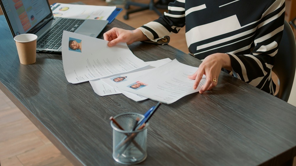 HR manager looking through resumes